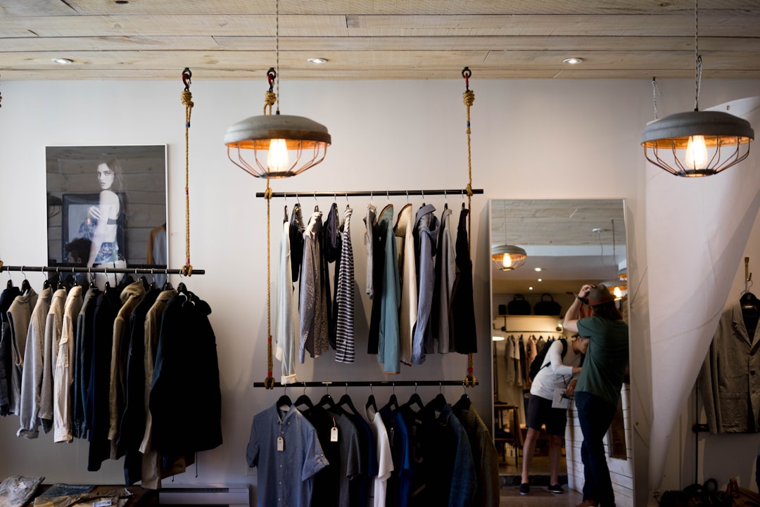 Clothing boutique interior with hanging racks